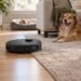 eufy Robot Vacuum Omni E35 cleaning pet hair on hardwood flooring and a low-pile rug beside a dog